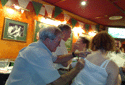 Bertie Auld signing a top in Benidorm, Spain